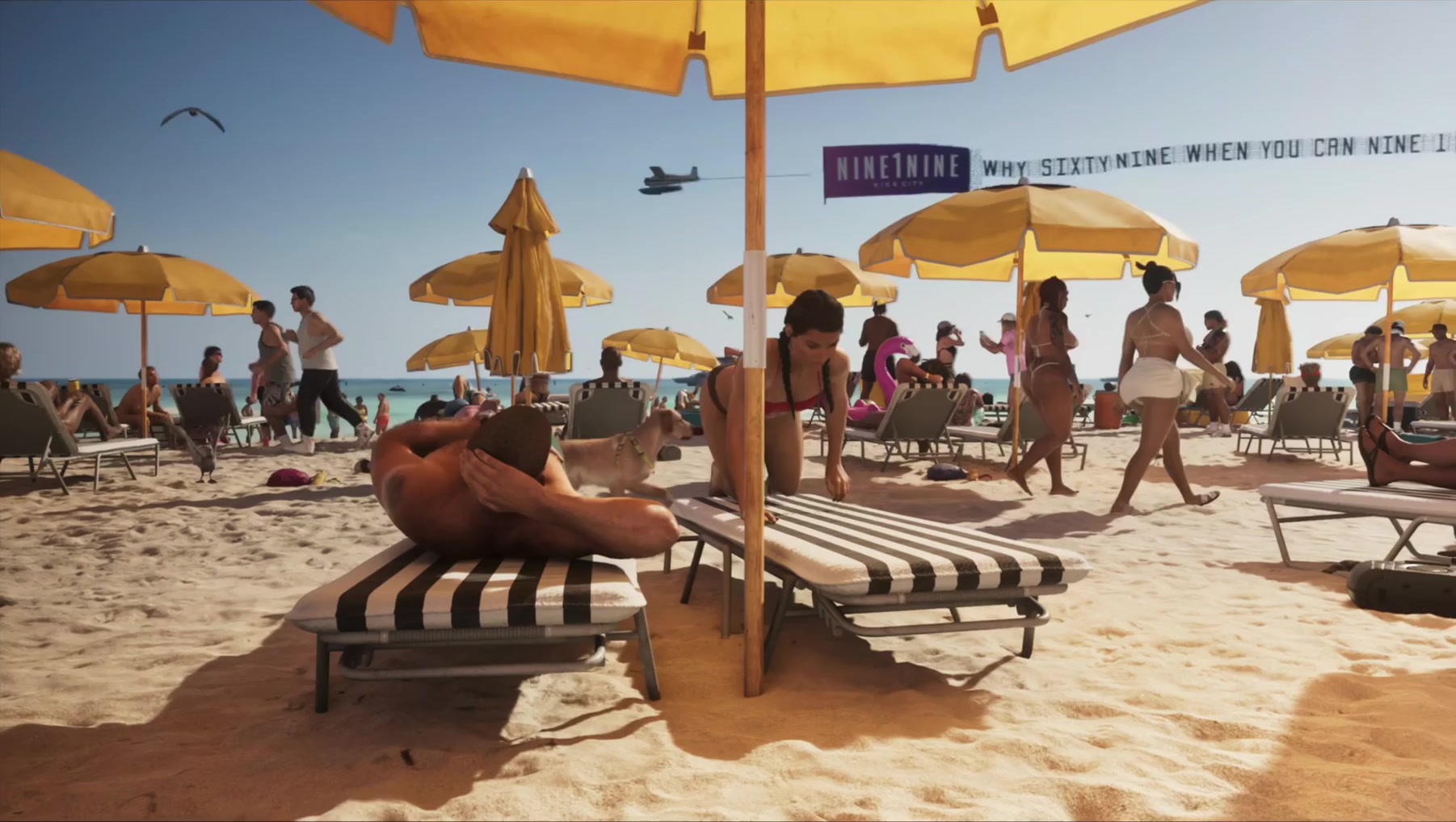 A packed Vice City beach as an ad plane tows a NINE1NINE banner overhead