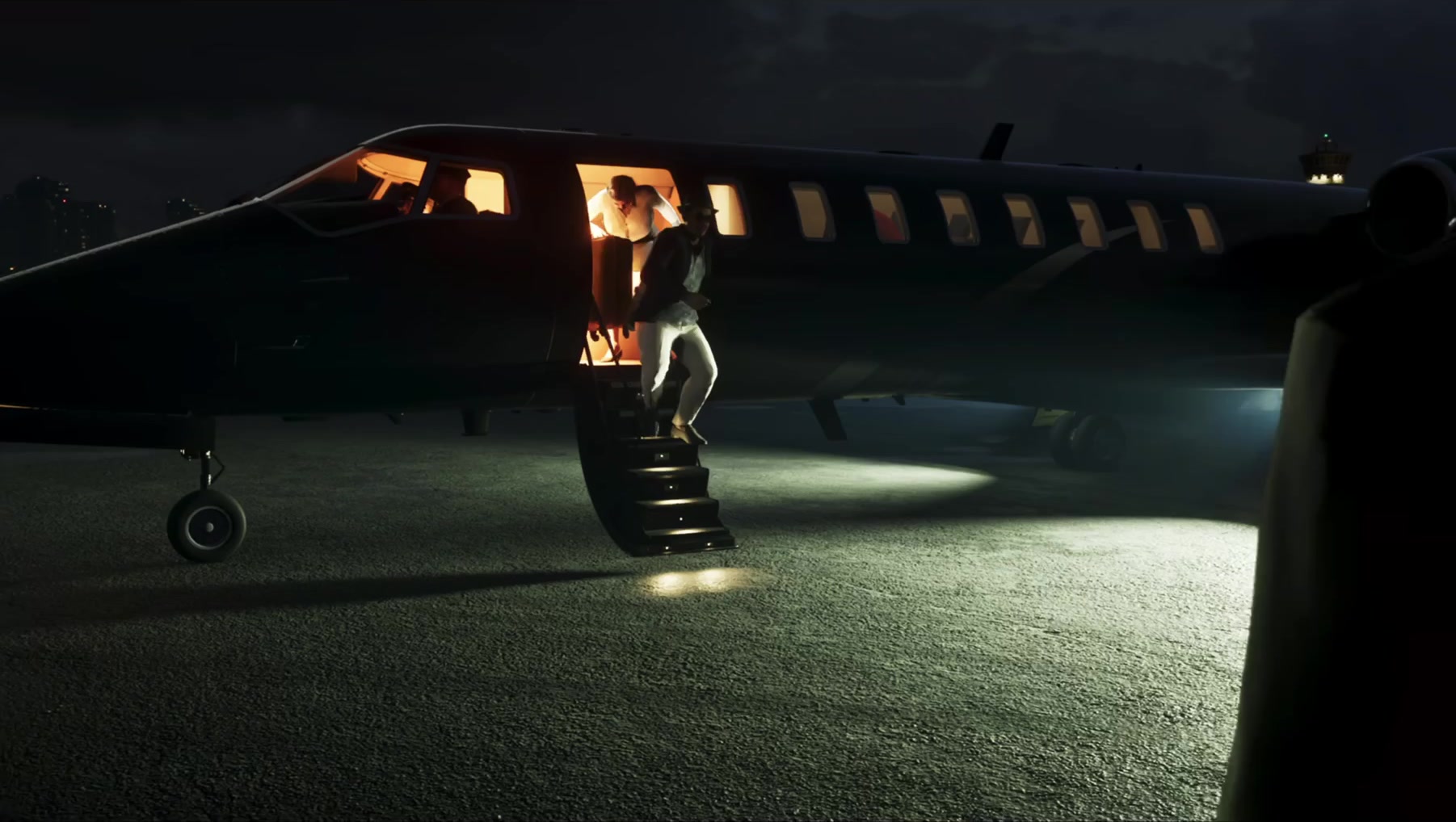 A private jet on the apron at night in Leonida